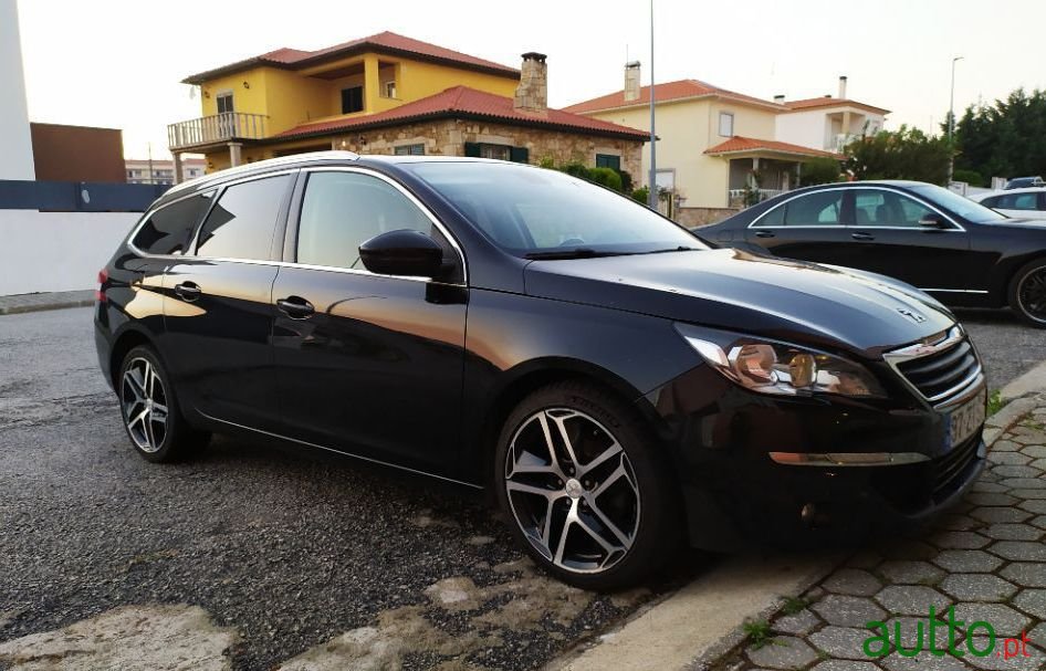 2014' Peugeot 308 Sw photo #1