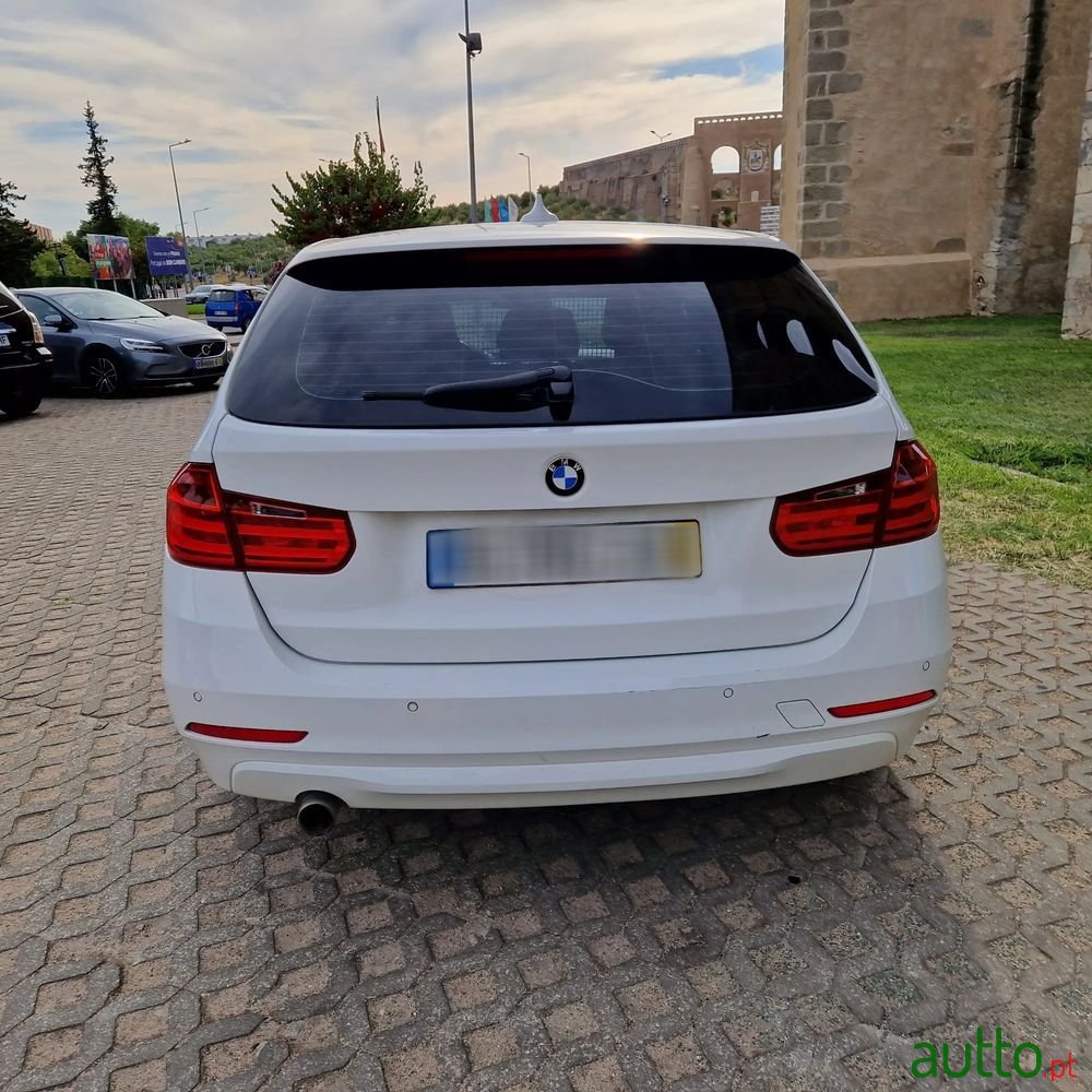 2013' BMW Série 3 D Touring photo #3
