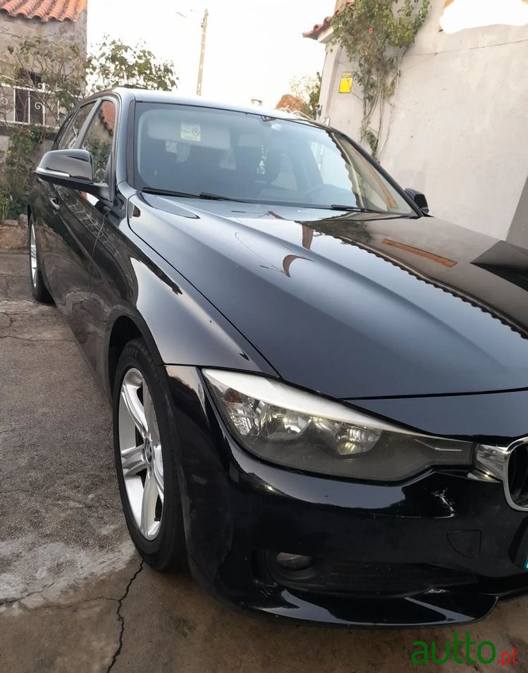 2013' BMW Série 3 D Touring photo #2