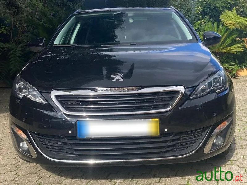 2014' Peugeot 308 Sw photo #1