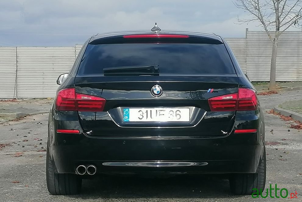 2014' BMW 520 photo #1