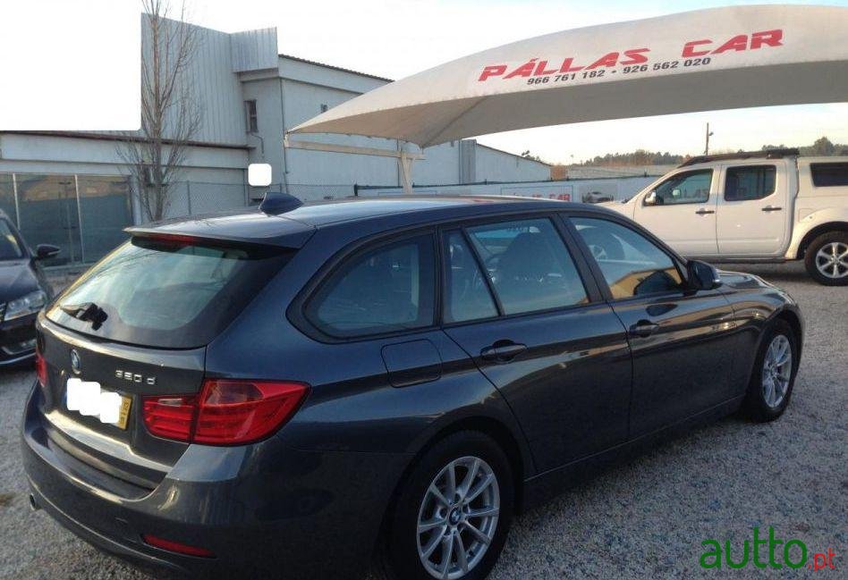 2012' BMW 320 D Touring Navigation photo #1