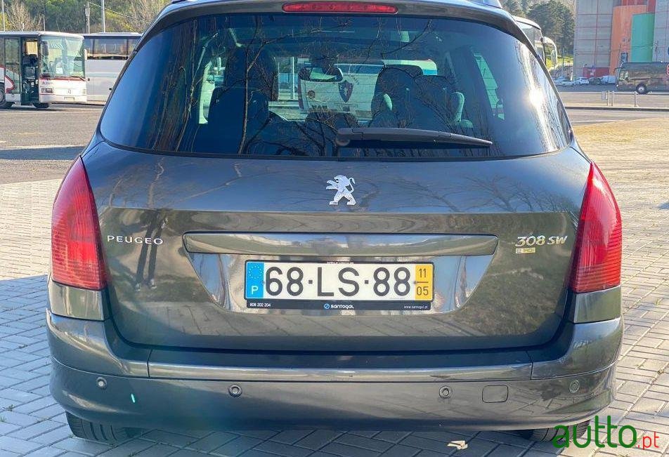 2011' Peugeot 308 Sw photo #1