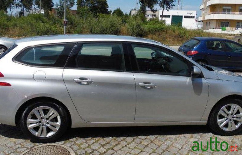 2014' Peugeot 308 Sw photo #1