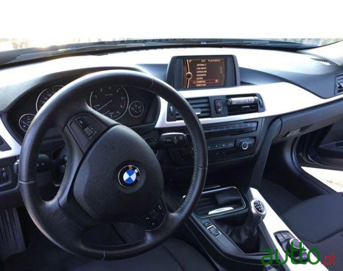 2013' BMW 318 D Touring Nacional photo #4