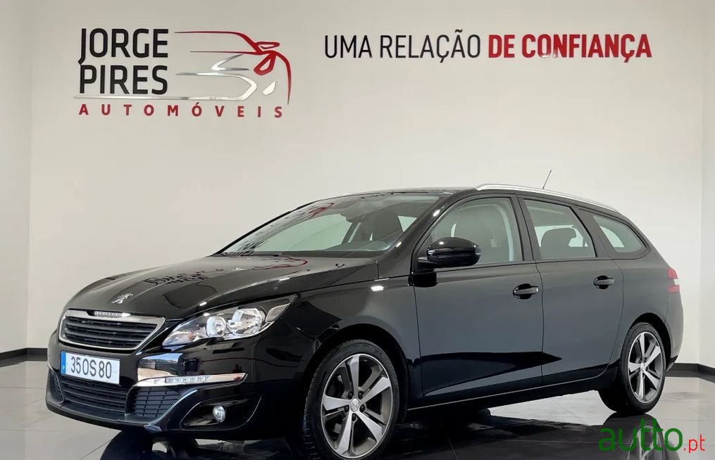 2014' Peugeot 308 Sw photo #1