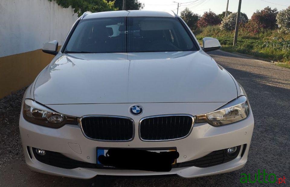 2014' BMW 318 D Touring photo #2