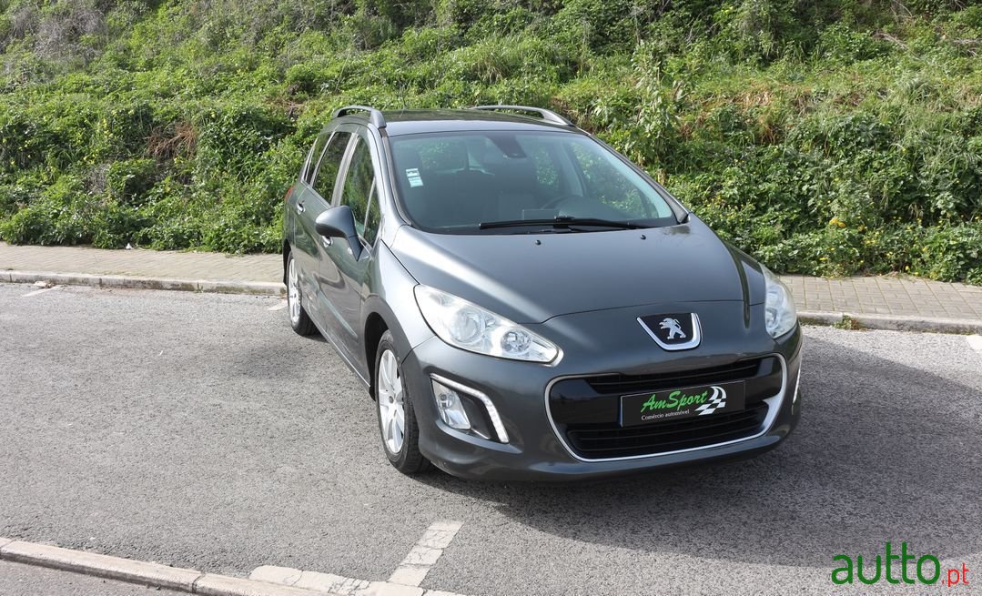 2012' Peugeot 308 Sw photo #2