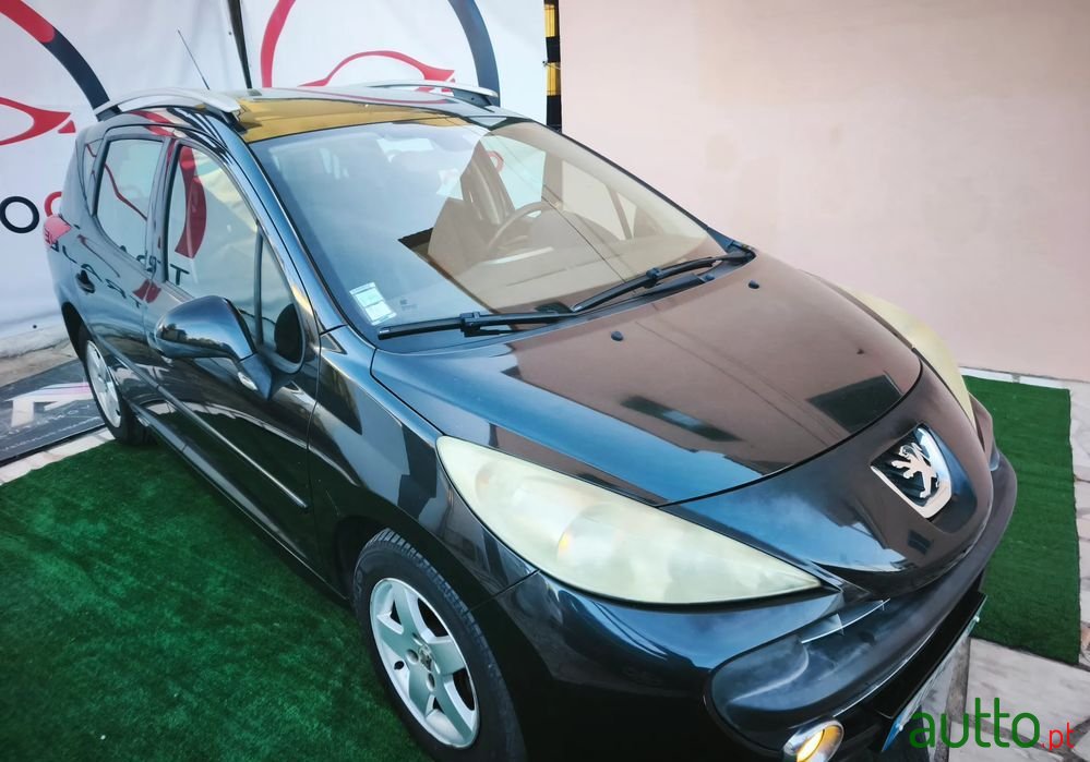 2009' Peugeot 207 Sw photo #1