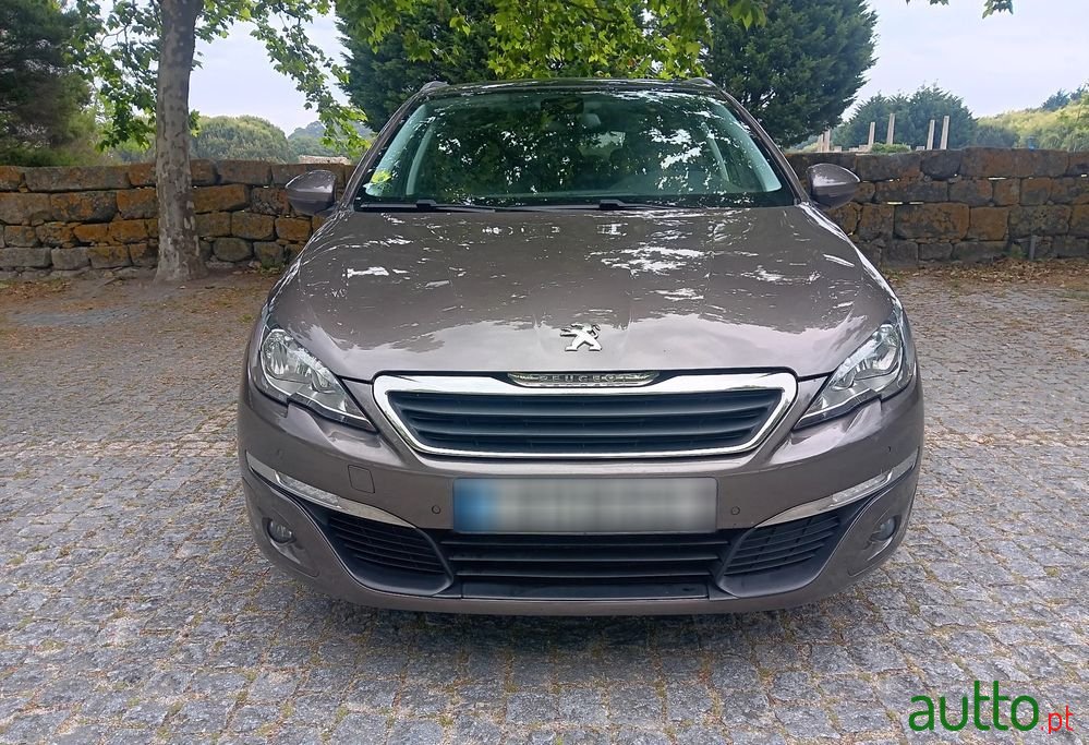 2014' Peugeot 308 Sw photo #1