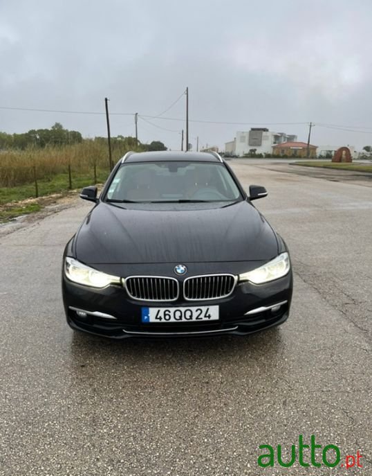 2015' BMW 318 photo #1