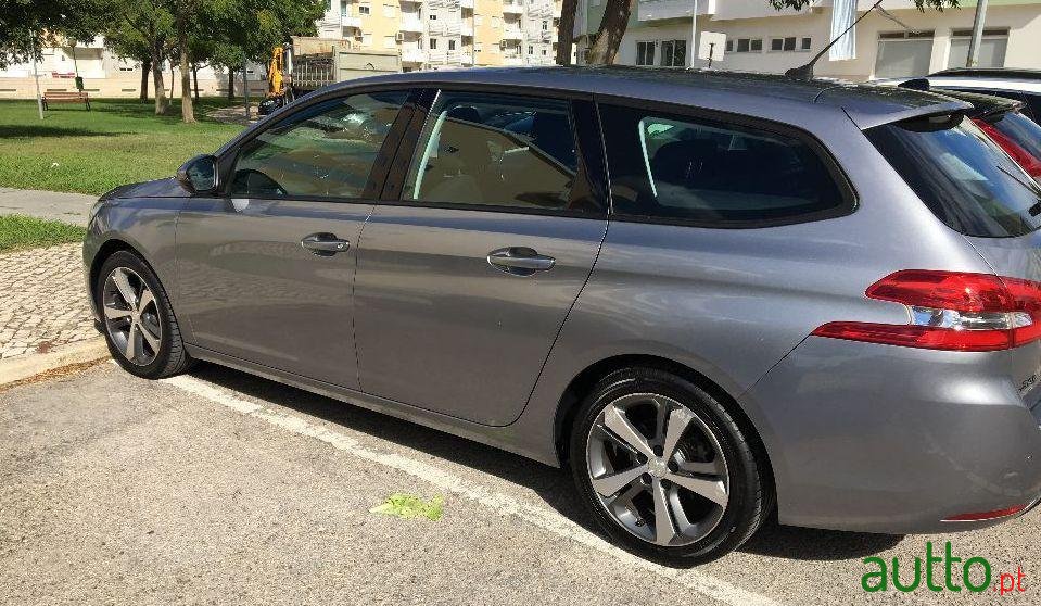 2014' Peugeot 308 Sw photo #1