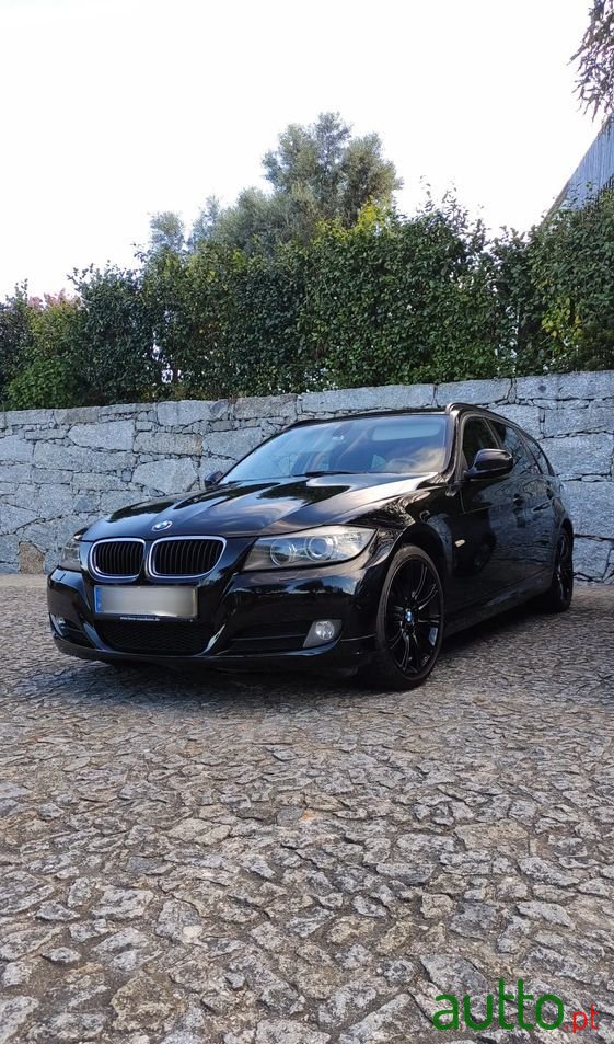 2011' BMW Série 3 D Touring Navigation photo #1