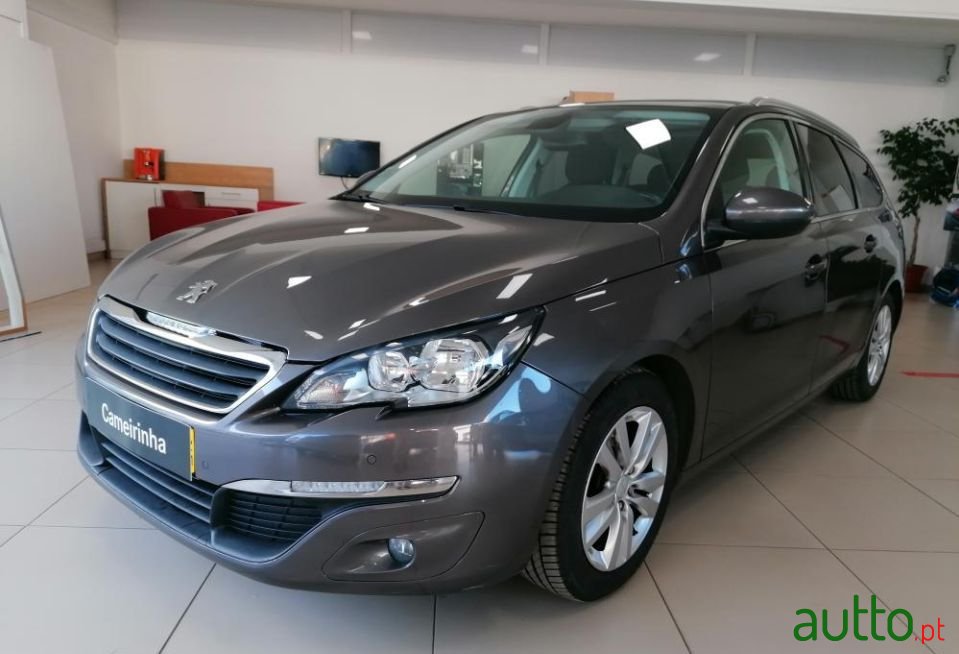 2014' Peugeot 308 Sw photo #1