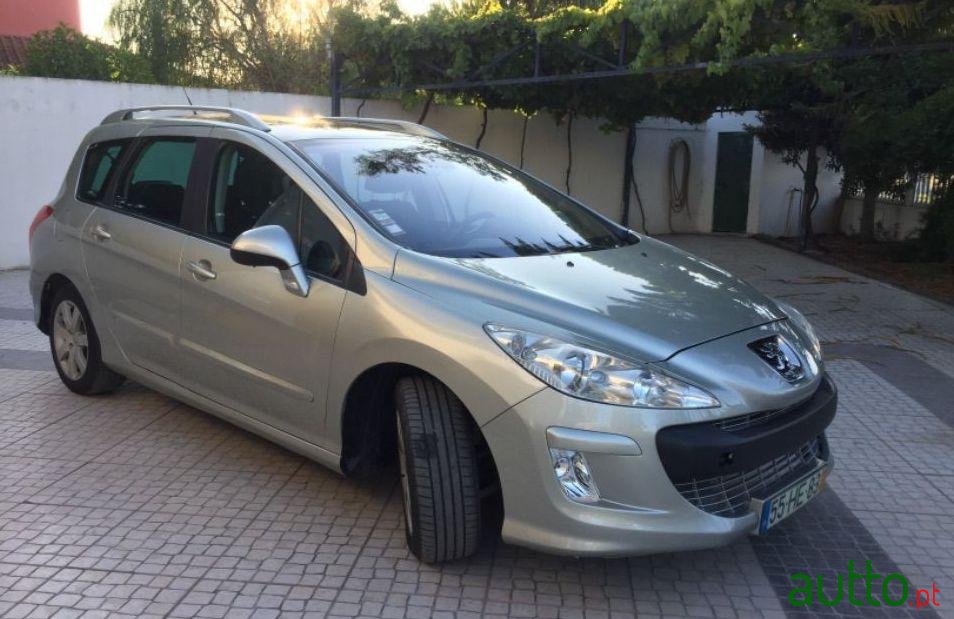 2009' Peugeot 308 Sw photo #1