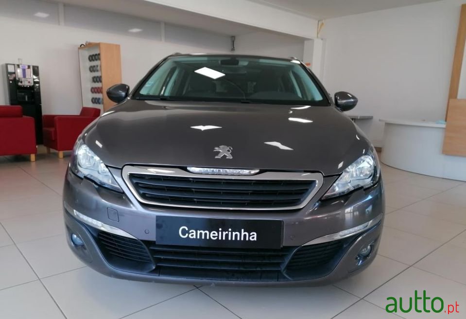 2014' Peugeot 308 Sw photo #1