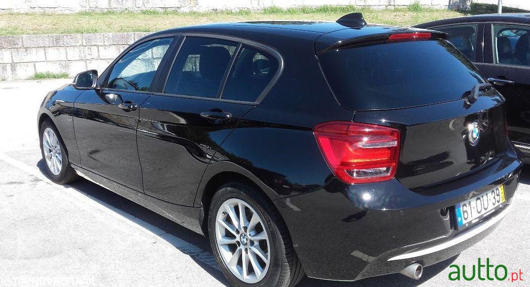 2014' BMW 116 Série 1 photo #2