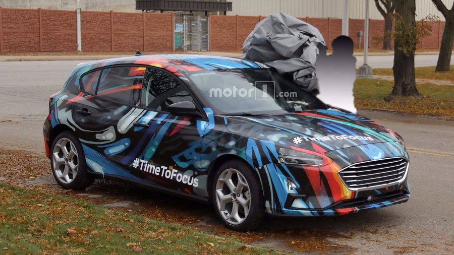 2019 Ford Focus Hatchback Spied Nearly Naked In Funky Camouflage