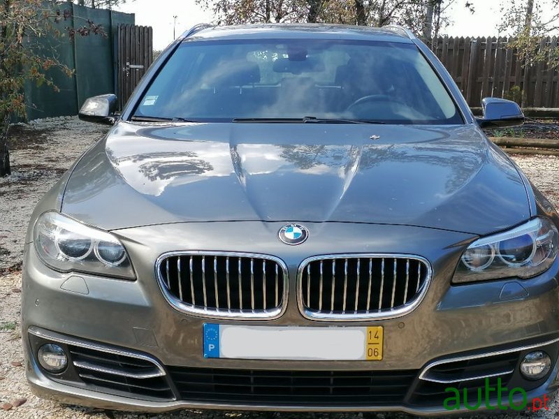 2014' BMW 520 photo #1