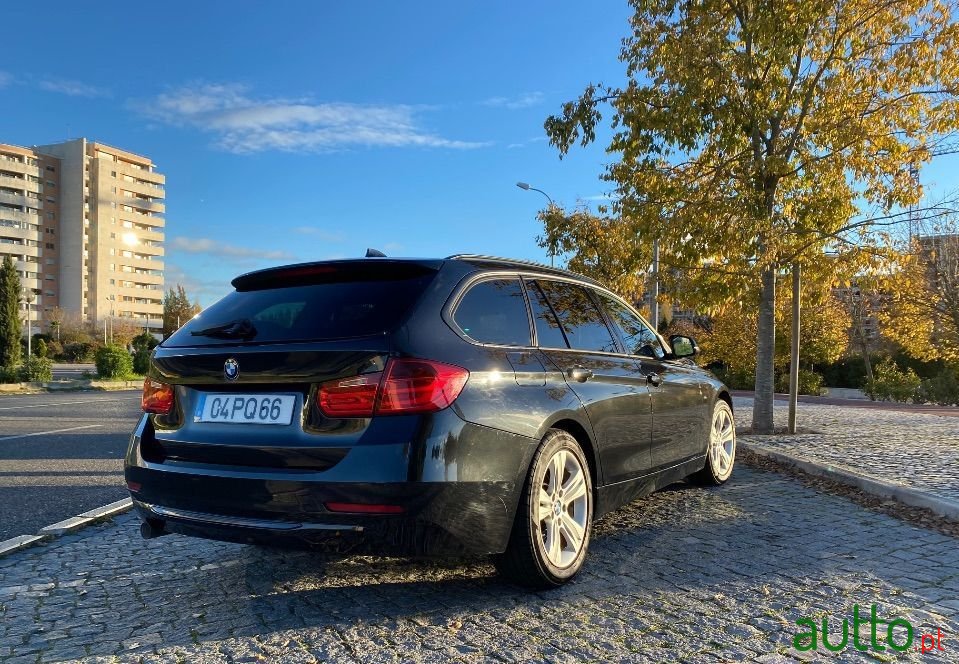 2015' BMW 318 Sport photo #2