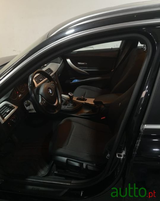 2014' BMW 318 photo #5