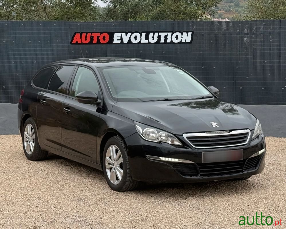 2014' Peugeot 308 Sw photo #1