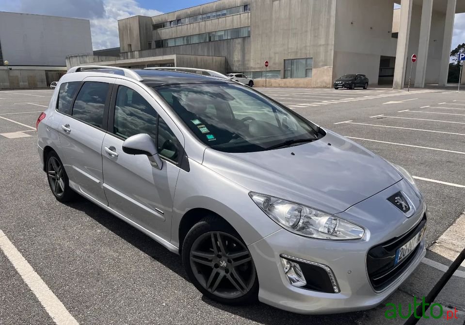 2013' Peugeot 308 Sw photo #1