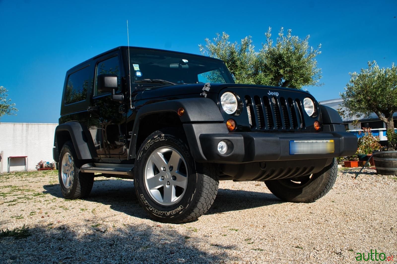 2011' Jeep Wrangler photo #1