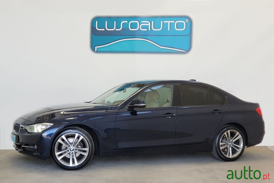 2014' BMW 318 Sport photo #1