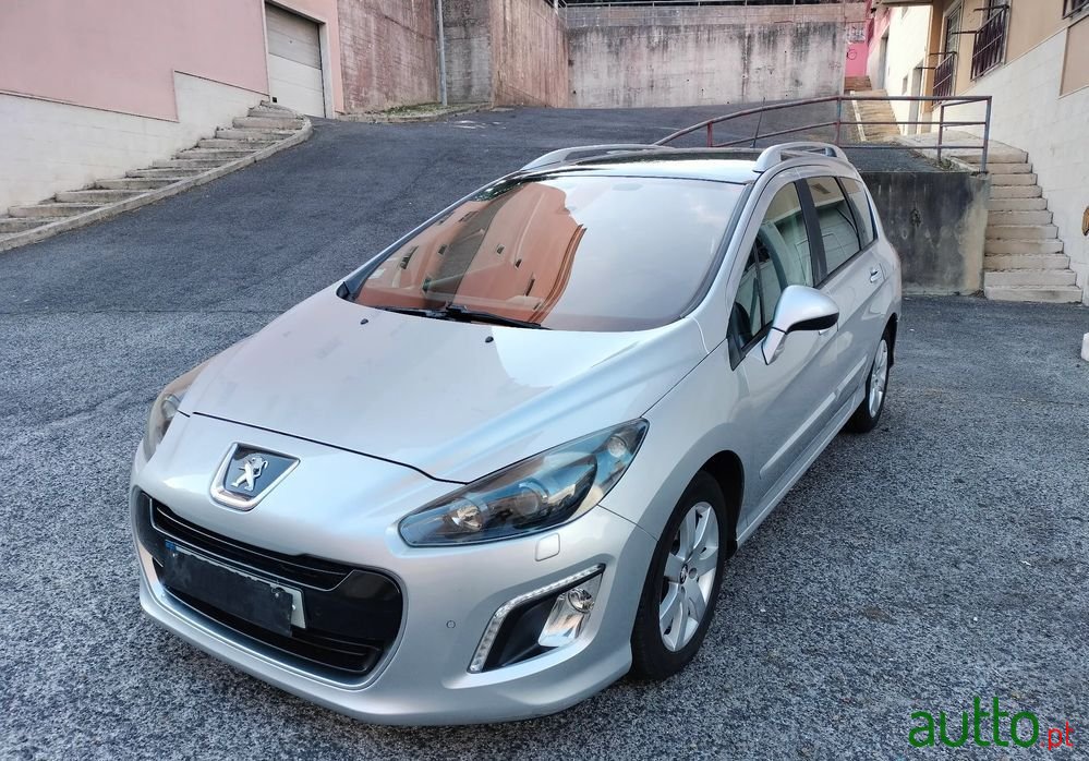 2013' Peugeot 308 Sw photo #1