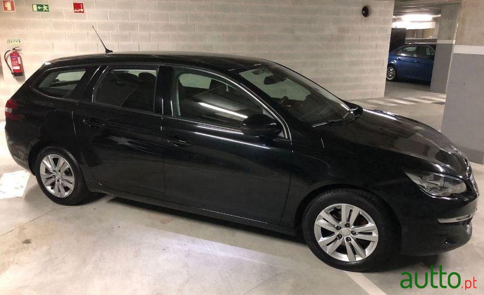 2014' Peugeot 308 Sw photo #1