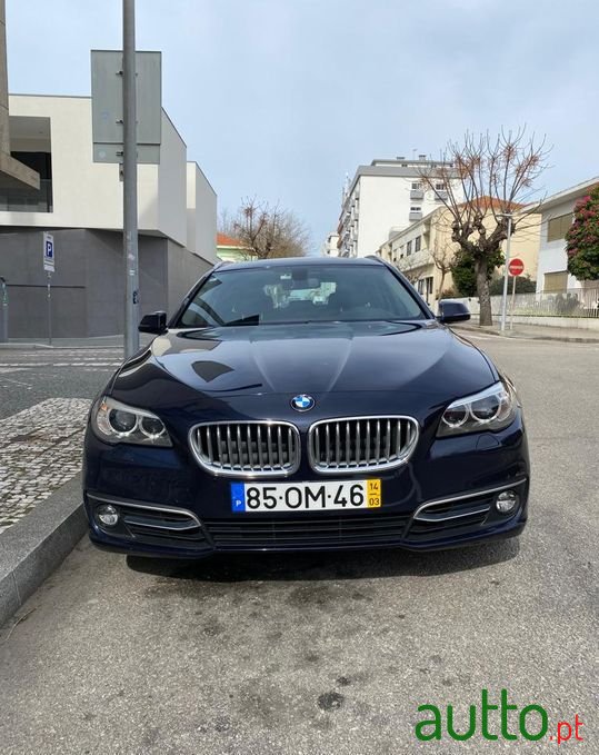 2014' BMW 520 photo #1