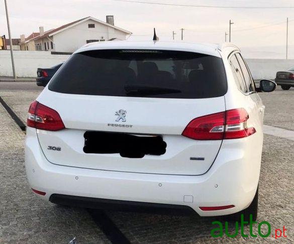 2014' Peugeot 308 Sw photo #1