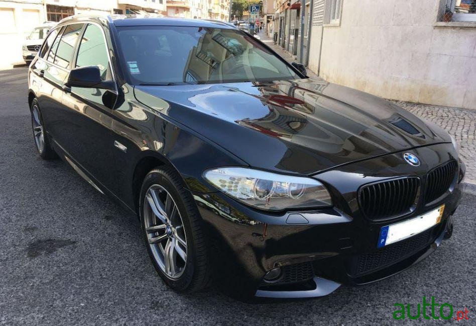 2013' BMW 520 photo #1