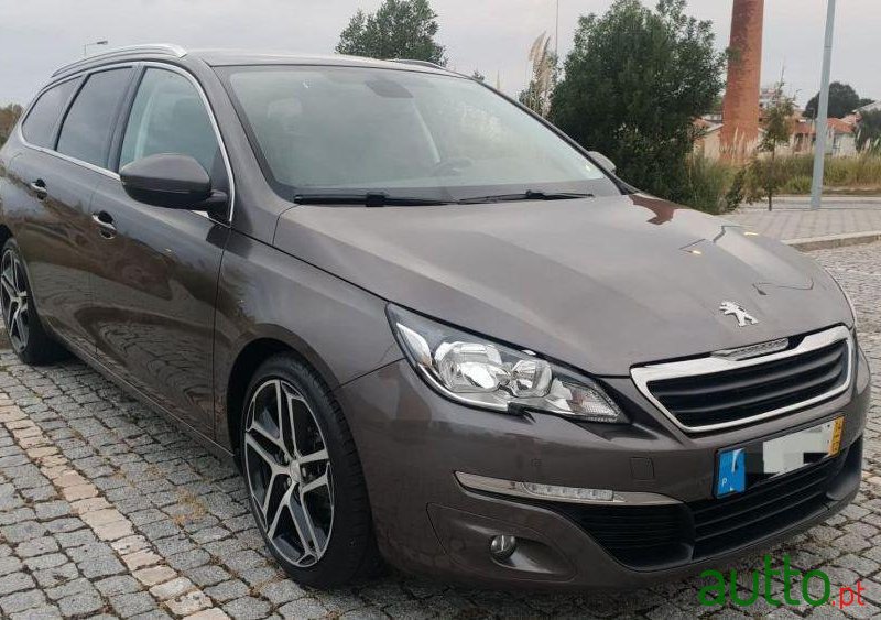 2014' Peugeot 308 Sw photo #1