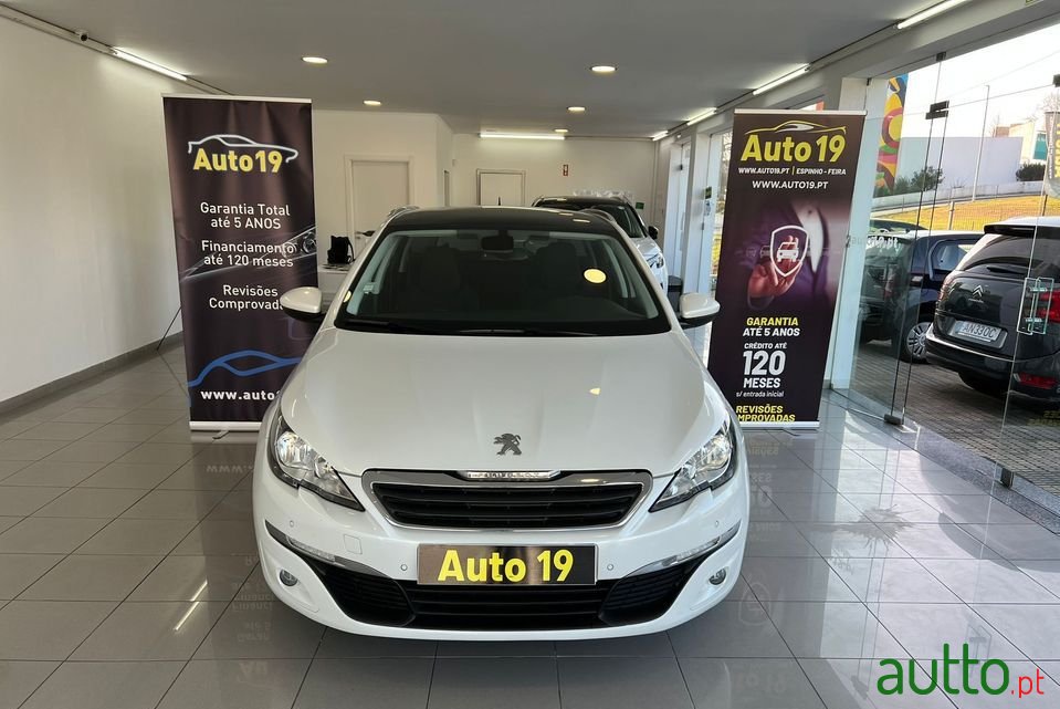 2014' Peugeot 308 Sw photo #1