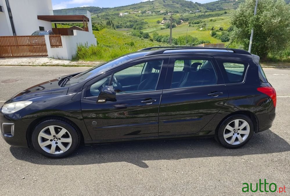 2013' Peugeot 308 Sw photo #1