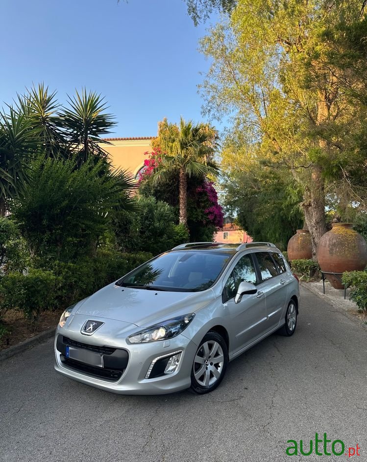 2013' Peugeot 308 Sw photo #1