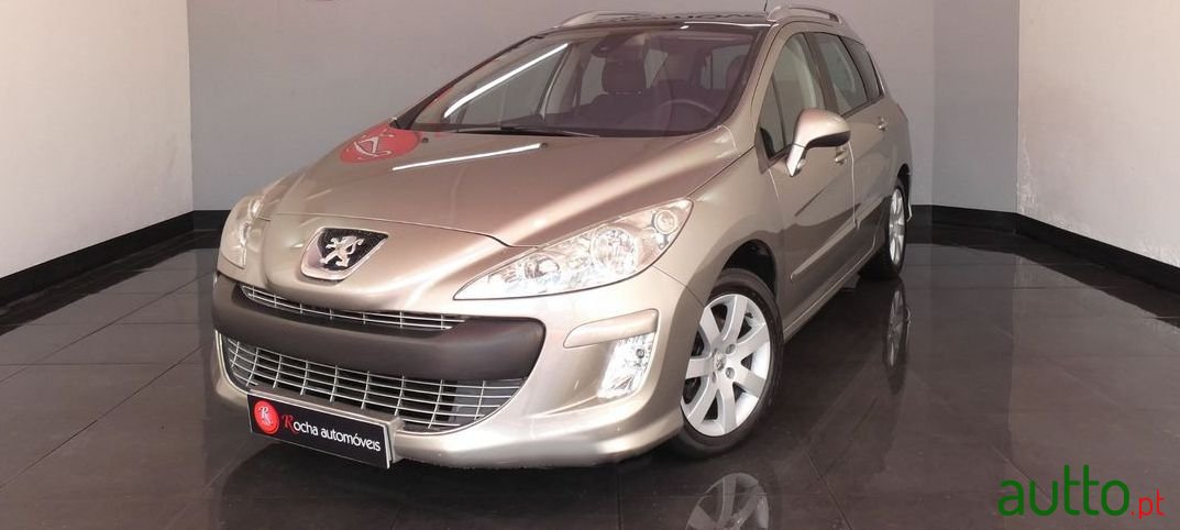 2008' Peugeot 308 Sw photo #1