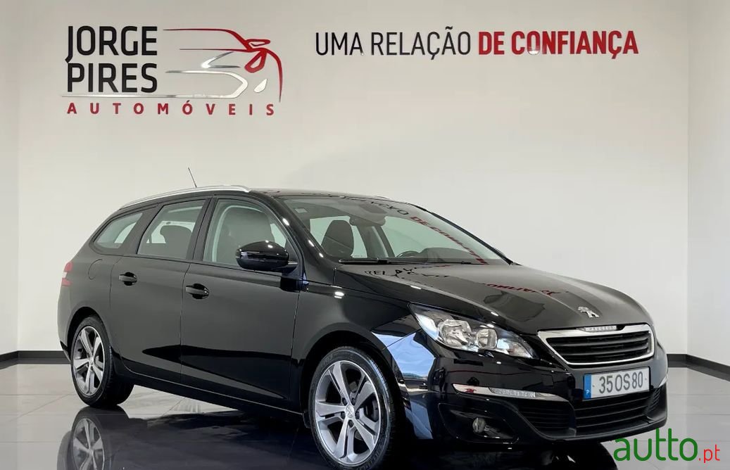 2014' Peugeot 308 Sw photo #1