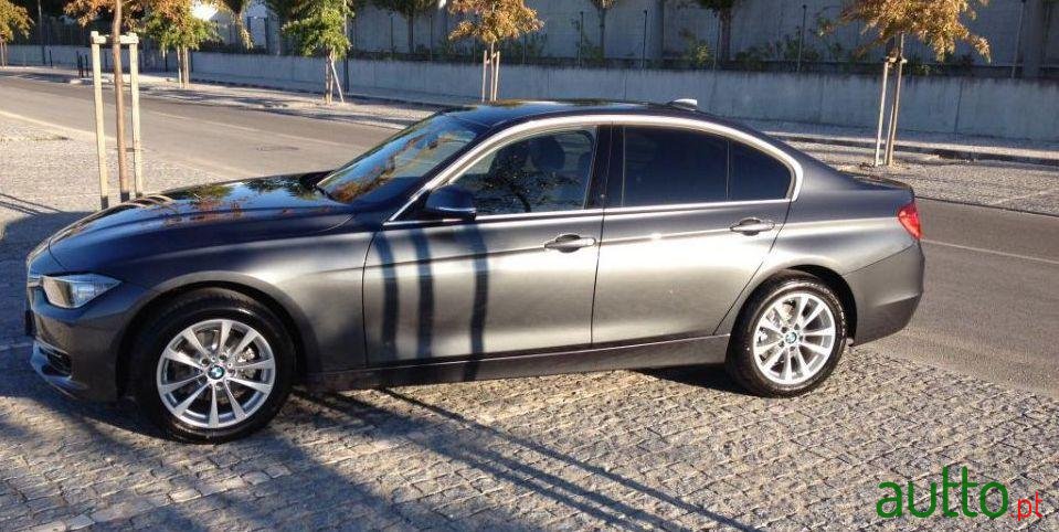 2014' BMW 318 photo #1