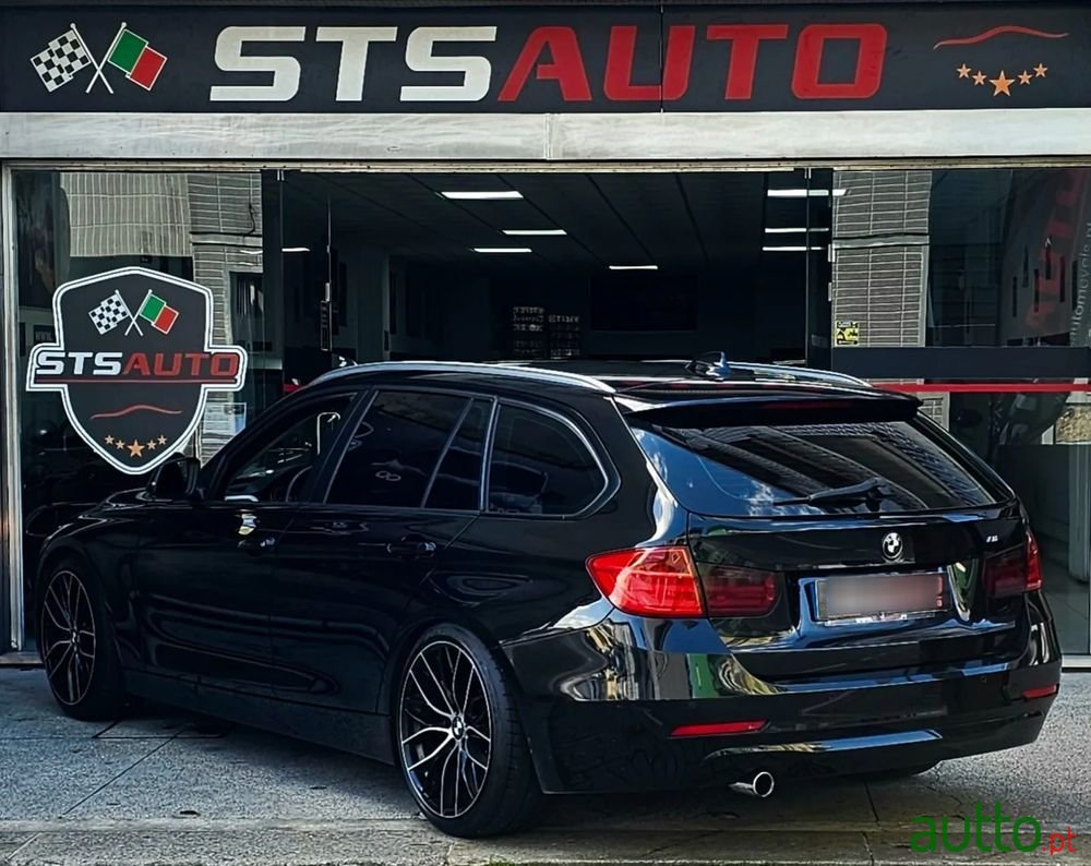 2013' BMW Série 3 D Touring photo #4