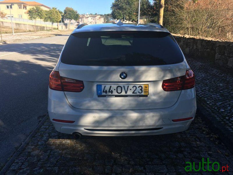 2014' BMW 318 D Touring Line Sport photo #1