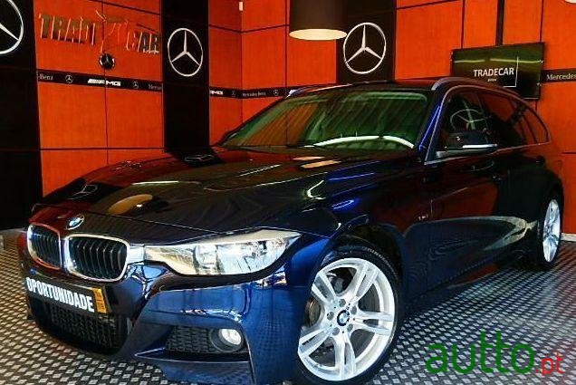 2014' BMW 318 D Touring Auto Line Sport photo #2