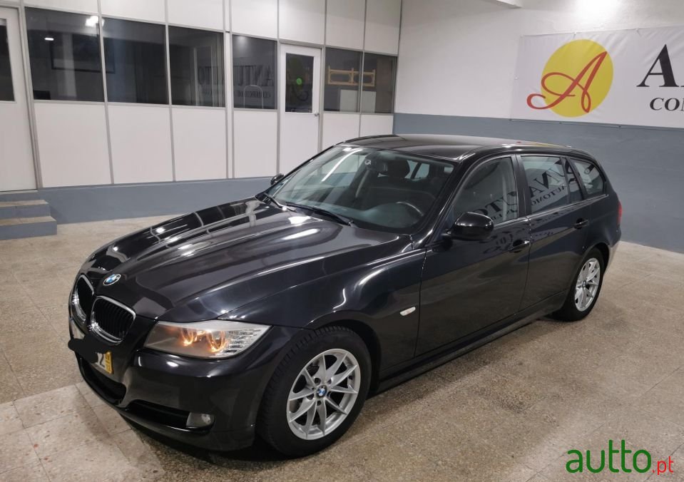 2009' BMW 318 photo #1