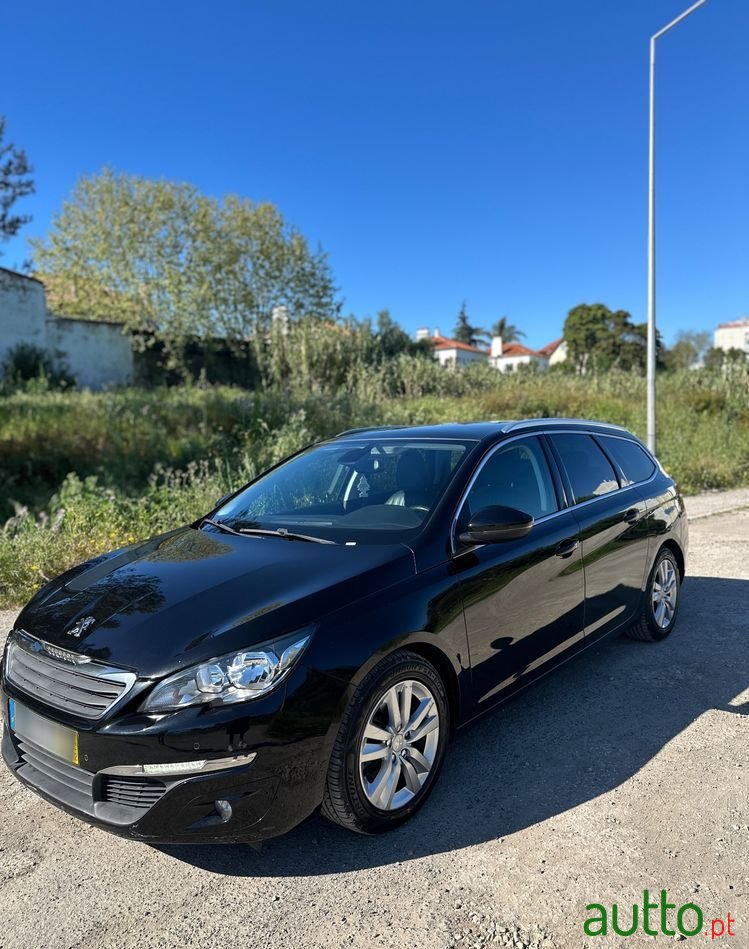 2014' Peugeot 308 Sw photo #1