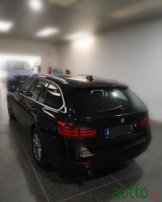 2014' BMW 318 photo #3