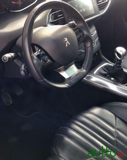 2014' Peugeot 308 Sw photo #1