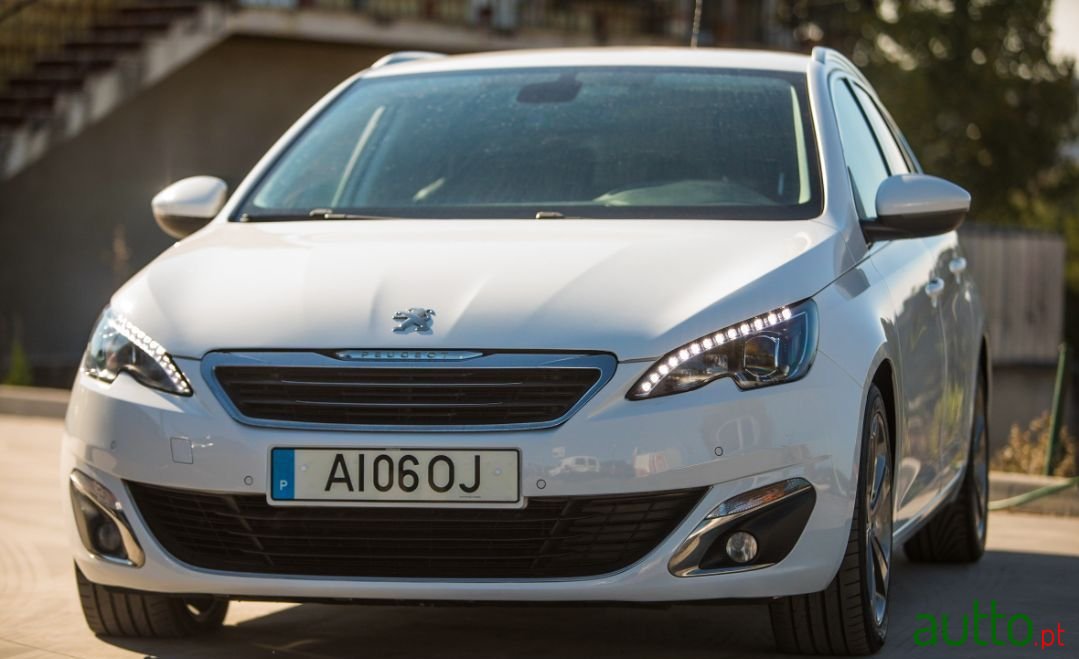 2014' Peugeot 308 Sw photo #1