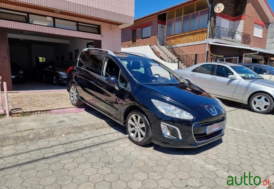 2012' Peugeot 308 Sw photo #2